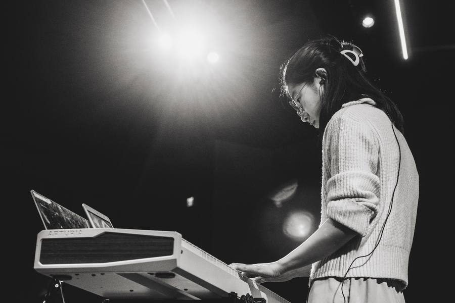 A young musician at the keyboard