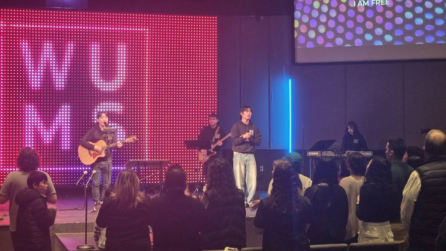 The band on stage at WUMS 2025